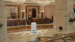 PUDU FlashBot in a hotel lobby setting